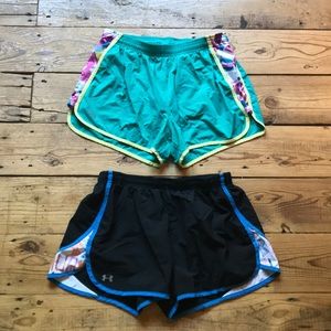 2 pairs of Under armour running shorts